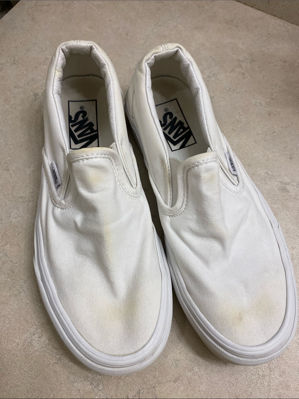 Vans White Canvas Slip-On Sneakers